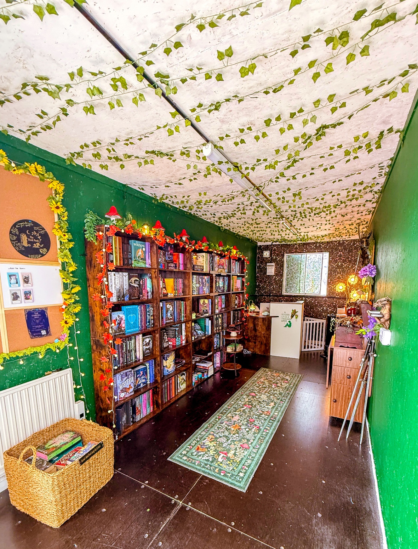 Interior of The Book Nook with ivy-covered ceiling